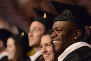 Graduate smiles during the Saint Rose commencement ceremony.