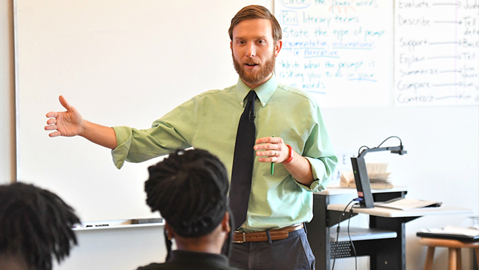 Steven Gamache G'10 teaching in his New Orleans classroom