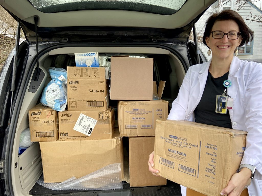 Saint Rose Health Services Nurse Practitioner Emily Ilowit with medical supplies donated to Albany Medical Center.